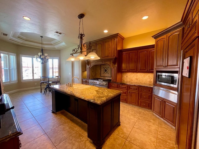 16052 W Middleton Ave, Kerman, CA 93630 - kitchen with a sink, appliances with stainless steel finishes, a warming drawer, tasteful backsplash, and light stone counters
