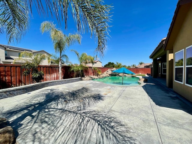 16052 W Middleton Ave, Kerman, CA 93630 - view of pool with a patio area and a fenced backyard