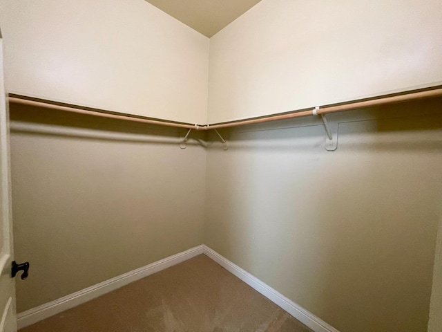 16052 W Middleton Ave, Kerman, CA 93630 - walk in closet featuring carpet floors