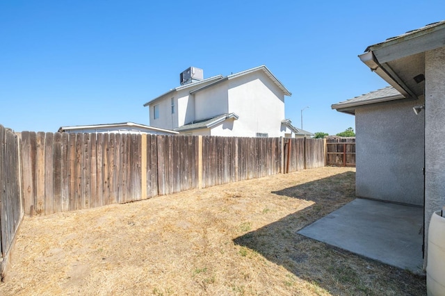 2063 S Tupman Ave, Fresno, CA 93706 - fenced backyard featuring central air condition unit