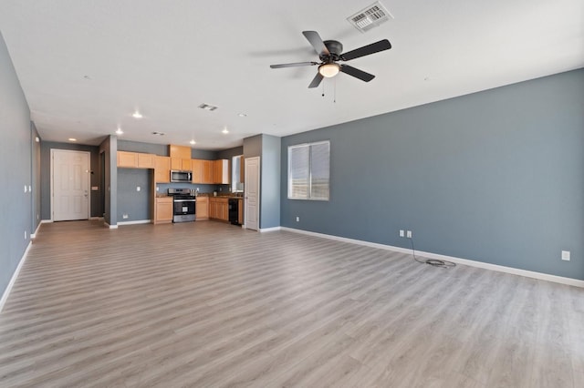 unfurnished living room featuring baseboards, light wood-style floors, a ceiling fan, and recessed lighting