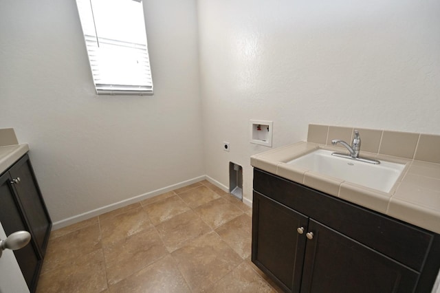 laundry room featuring washer hookup, hookup for an electric dryer, cabinet space, and baseboards