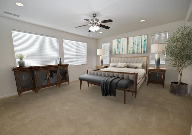 bedroom with baseboards, light carpet, recessed lighting, and ceiling fan