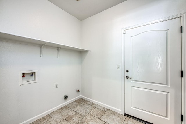 laundry area featuring hookup for a washing machine and baseboards