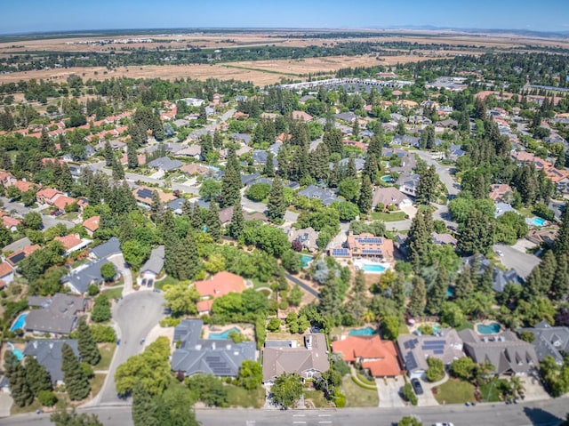 aerial overview of property's location featuring nearby suburban area