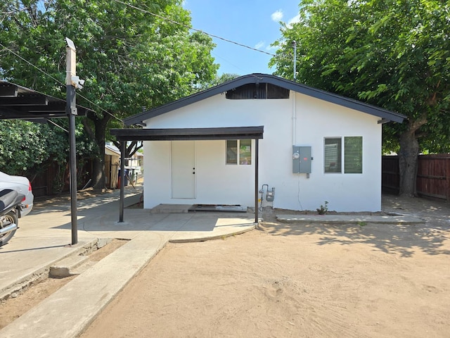 view of front of property featuring stucco siding