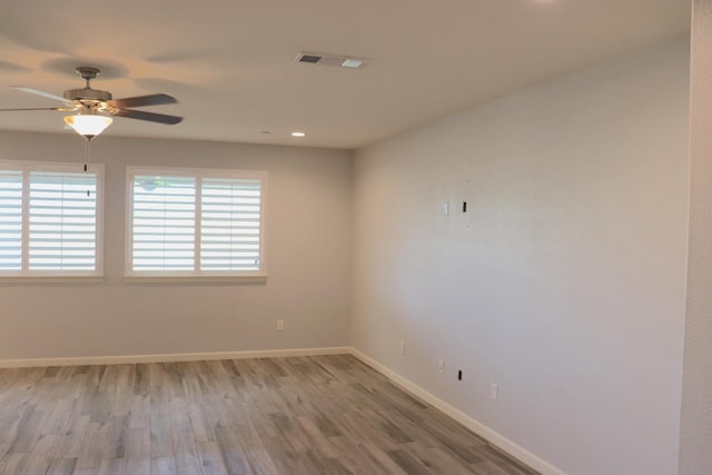 1884 Clover, Dinuba, CA 93618 - empty room featuring wood finished floors, ceiling fan, baseboards, and recessed lighting