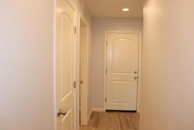 1884 Clover, Dinuba, CA 93618 - hallway featuring light wood-style flooring, recessed lighting, and baseboards