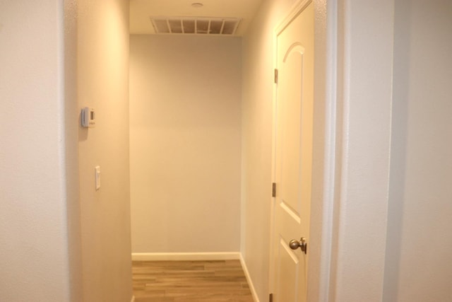 1884 Clover, Dinuba, CA 93618 - hall with light wood-style flooring and baseboards