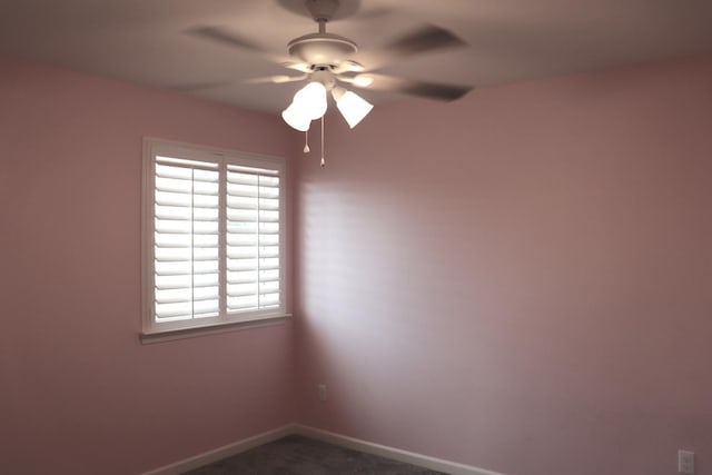 1884 Clover, Dinuba, CA 93618 - empty room featuring ceiling fan, baseboards, and dark colored carpet