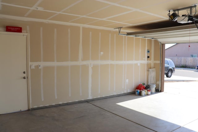 1884 Clover, Dinuba, CA 93618 - garage featuring a garage door opener