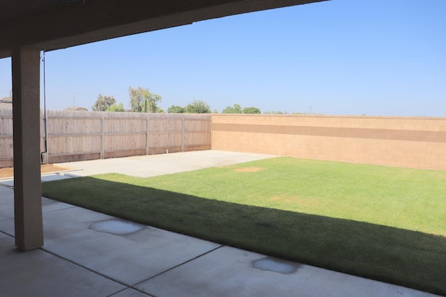 1884 Clover, Dinuba, CA 93618 - fenced backyard featuring a patio
