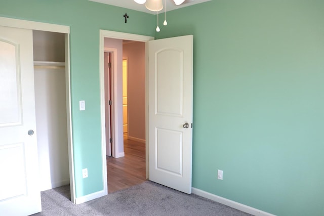 1884 Clover, Dinuba, CA 93618 - unfurnished bedroom with carpet floors, baseboards, and a closet