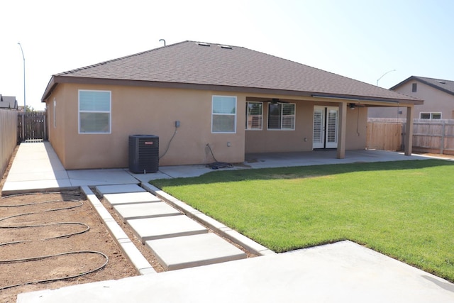 1884 Clover, Dinuba, CA 93618 - rear view of property featuring a patio, stucco siding, central AC unit, ceiling fan, and a shingled roof
