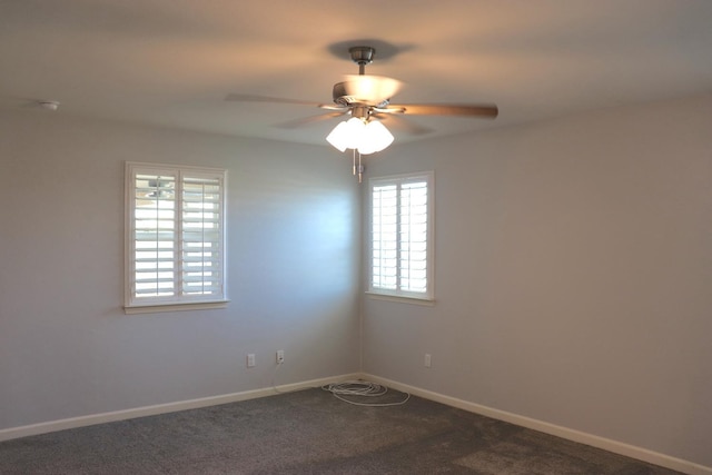 1884 Clover, Dinuba, CA 93618 - empty room featuring ceiling fan, dark colored carpet, and baseboards