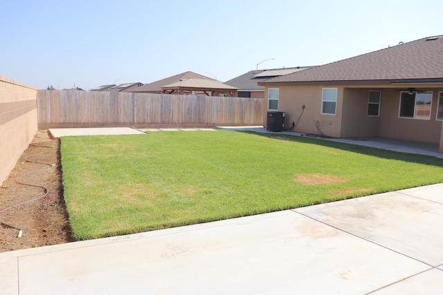 1884 Clover, Dinuba, CA 93618 - view of yard featuring a patio and cooling unit