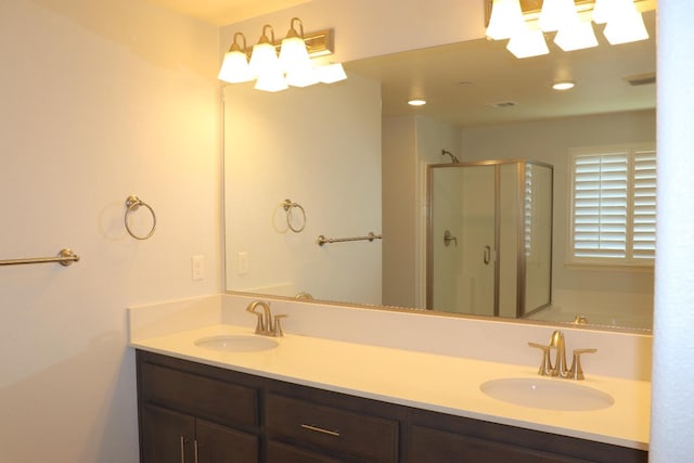 1884 Clover, Dinuba, CA 93618 - bathroom with a shower stall and double vanity