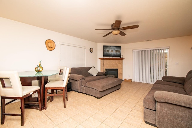 45704 Butternut Ln, Yokuts Valley, CA 93675 - living area featuring a ceiling fan and a tile fireplace
