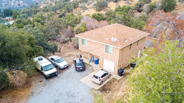 45704 Butternut Ln, Yokuts Valley, CA 93675 - aerial view of property and surrounding area featuring a heavily wooded area