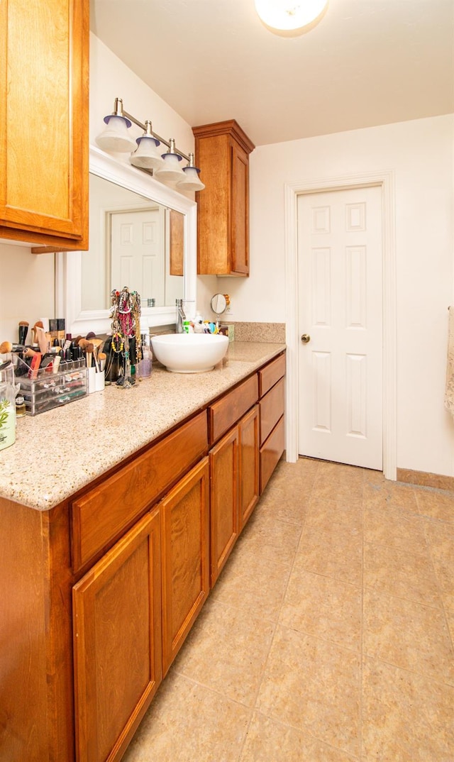 45704 Butternut Ln, Yokuts Valley, CA 93675 - bathroom with vanity and tile patterned floors