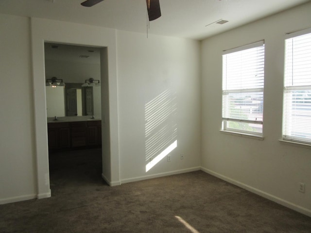1016 Papaya St, Madera, CA 93638 - carpeted empty room with a ceiling fan and baseboards
