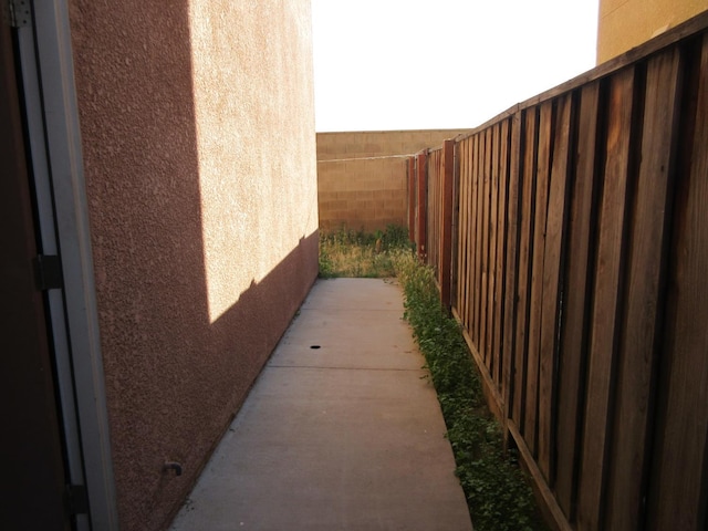 1016 Papaya St, Madera, CA 93638 - view of side of property with stucco siding
