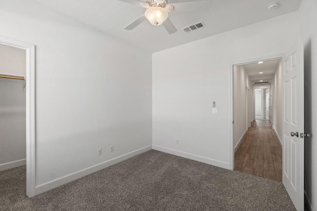 3822 Hannah Ln, Clovis, CA 93619 - unfurnished bedroom with carpet, baseboards, and a ceiling fan