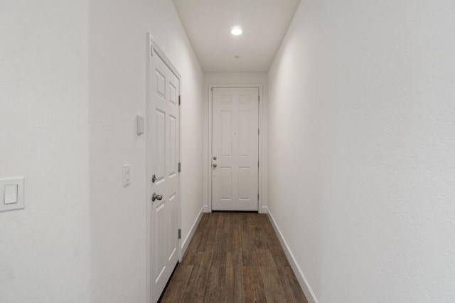 3822 Hannah Ln, Clovis, CA 93619 - hall featuring dark wood-type flooring, baseboards, and recessed lighting