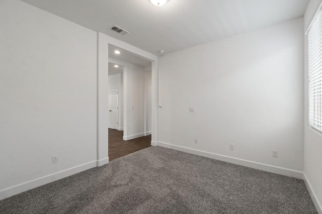 3822 Hannah Ln, Clovis, CA 93619 - spare room with dark colored carpet, baseboards, and recessed lighting