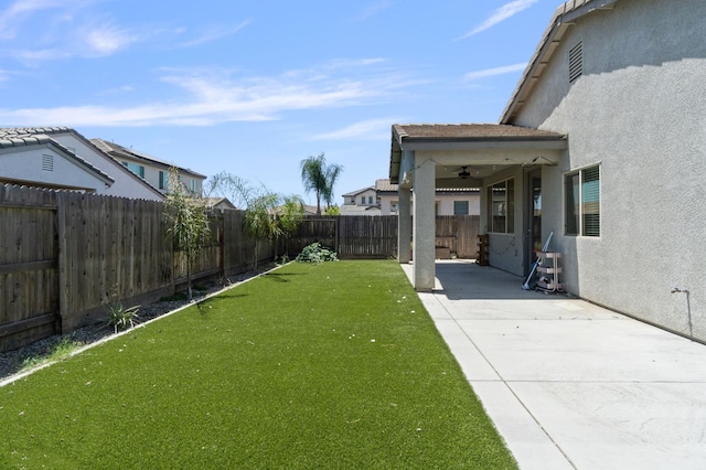3822 Hannah Ln, Clovis, CA 93619 - view of yard with a ceiling fan, a patio, and concrete driveway