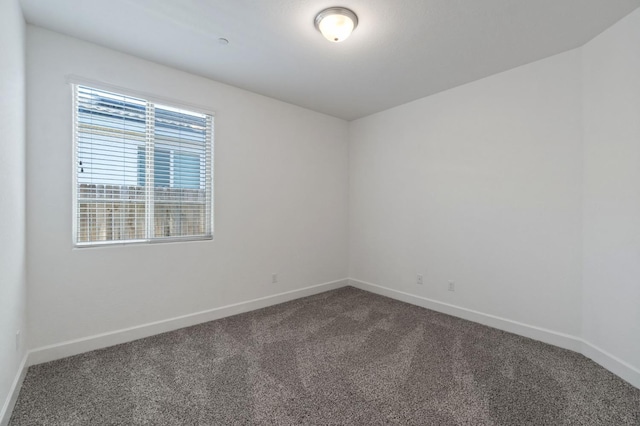 3822 Hannah Ln, Clovis, CA 93619 - unfurnished room featuring dark carpet and baseboards