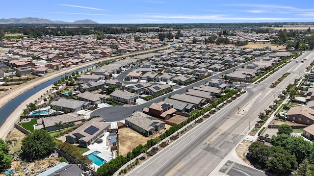 3822 Hannah Ln, Clovis, CA 93619 - aerial perspective of suburban area with a mountainous background and a pool area