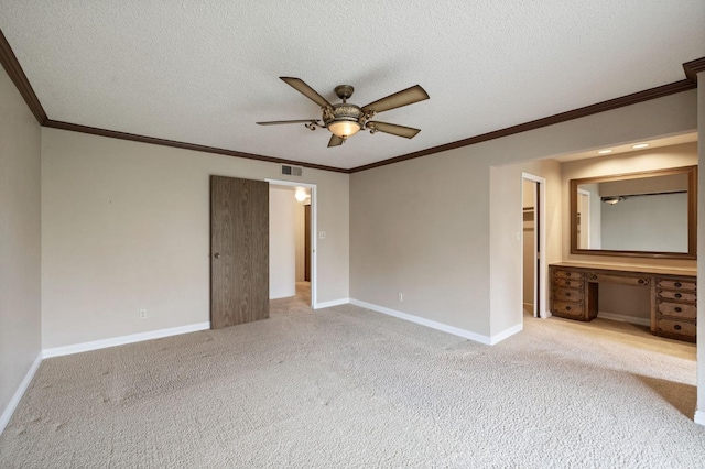 1322 W Millbrae Ave, Fresno, CA 93711 - unfurnished bedroom featuring crown molding, carpet flooring, a desk, baseboards, and a spacious closet