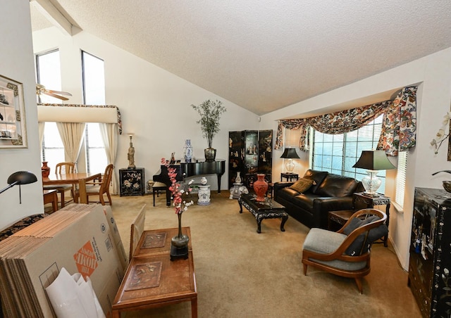 6340 N Gilroy Ave, Fresno, CA 93722 - carpeted living area with vaulted ceiling, a textured ceiling, and ceiling fan