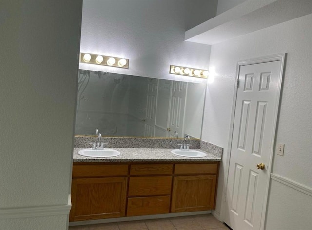 5323 W Garland Ave, Fresno, CA 93722 - full bath with double vanity and tile patterned floors