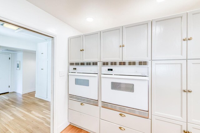 5669 N Arthur Ave, Fresno, CA 93711 - kitchen featuring white oven, light wood finished floors, recessed lighting, and baseboards