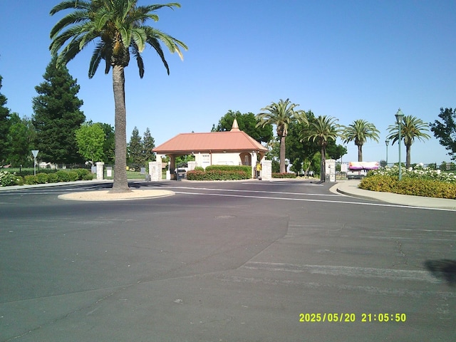 3030 Golf Dr W, Chowchilla, CA 93610 - view of asphalt street with curbs and sidewalks