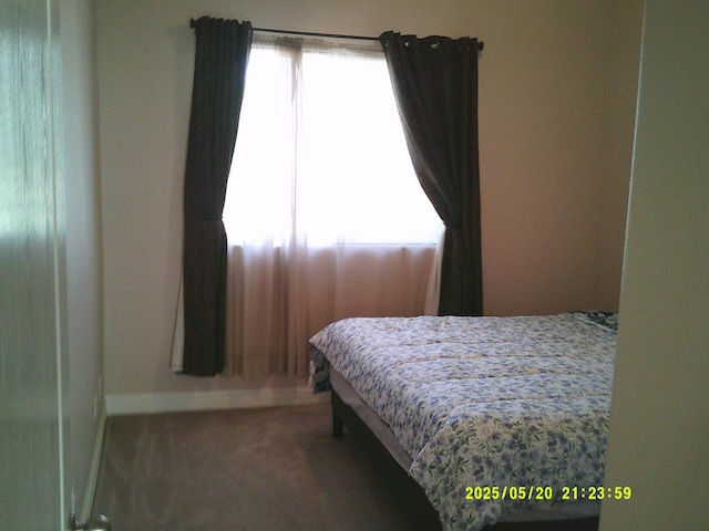 3030 Golf Dr W, Chowchilla, CA 93610 - carpeted bedroom with baseboards