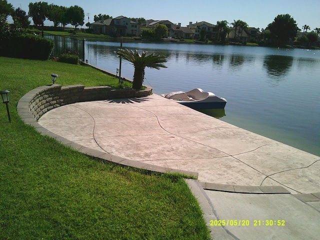 3030 Golf Dr W, Chowchilla, CA 93610 - dock area featuring a water view, a lawn, and a residential view