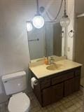 1212 Phillip St, Madera, CA 93638 - bathroom with toilet and vanity