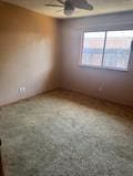 1212 Phillip St, Madera, CA 93638 - spare room with a ceiling fan