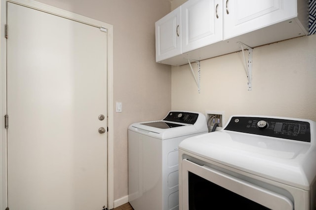 2326 W Flagstaff, Visalia, CA 93291 - laundry area featuring cabinet space and washer and dryer