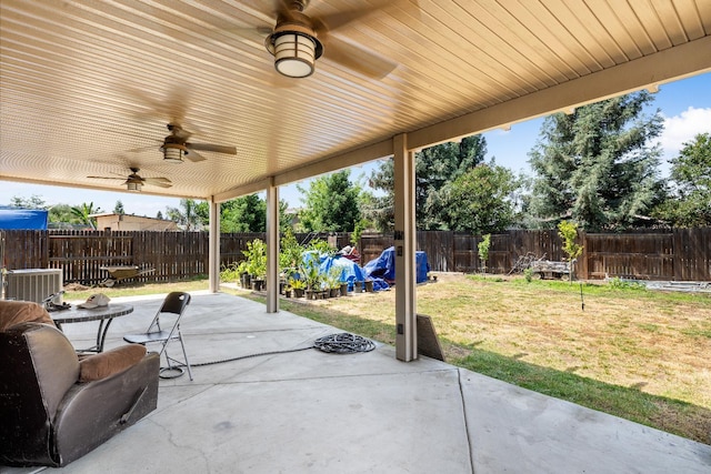 2326 W Flagstaff, Visalia, CA 93291 - fenced backyard featuring a ceiling fan, a patio area, and central AC unit