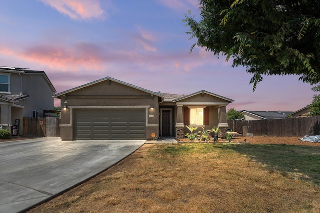 2326 W Flagstaff, Visalia, CA 93291 - ranch-style house with stucco siding, driveway, and a garage