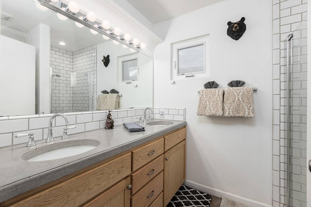 56981 Sequoia Dr, Springville, CA 93265 - bathroom featuring double vanity, a shower stall, and baseboards