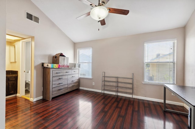 3591 W Harvard Ave, Fresno, CA 93722 - bedroom with lofted ceiling, dark wood-style flooring, and baseboards