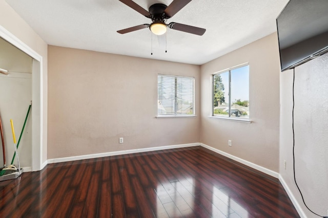 3591 W Harvard Ave, Fresno, CA 93722 - unfurnished bedroom featuring wood finished floors, baseboards, ceiling fan, and a closet