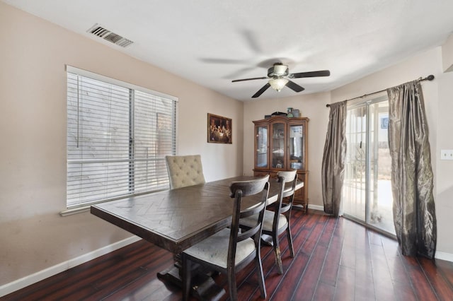 3591 W Harvard Ave, Fresno, CA 93722 - dining room with baseboards, ceiling fan, and dark wood finished floors