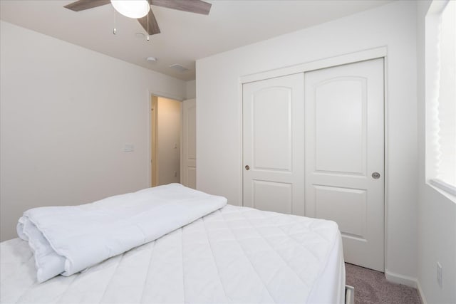 6618 E Grant Ave, Fresno, CA 93727 - carpeted bedroom with a closet, a ceiling fan, and baseboards