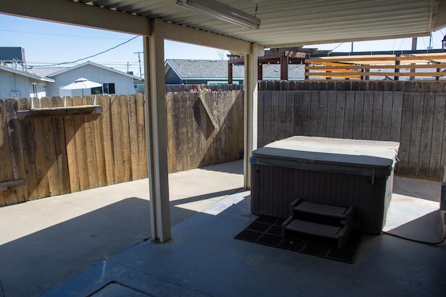 1913 N Waukena Way, Hanford, CA 93230 - view of patio featuring a hot tub